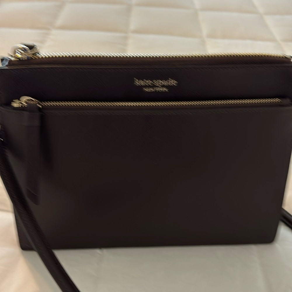 Kate Spade New York brown crossbody purse.
